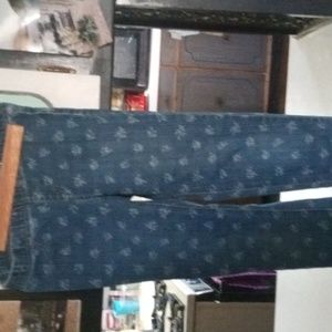 Girls size 12 Denim Leggings with floral pattern